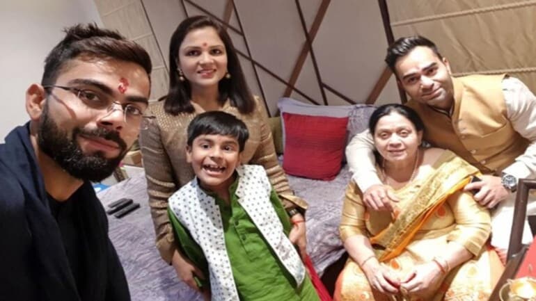Virat kohli with his family
